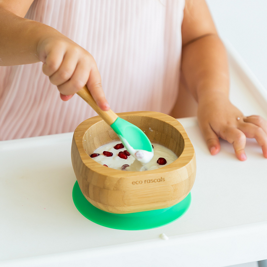 Eco Rascal Starting Solids Child Holding Spoon