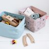 Reversible storage baskets for change table or toys from Done by Deer
