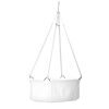 The Leander cradle basket is like a soft, white nest