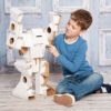 Boy playing with Calafant Robot cardboard Robot model